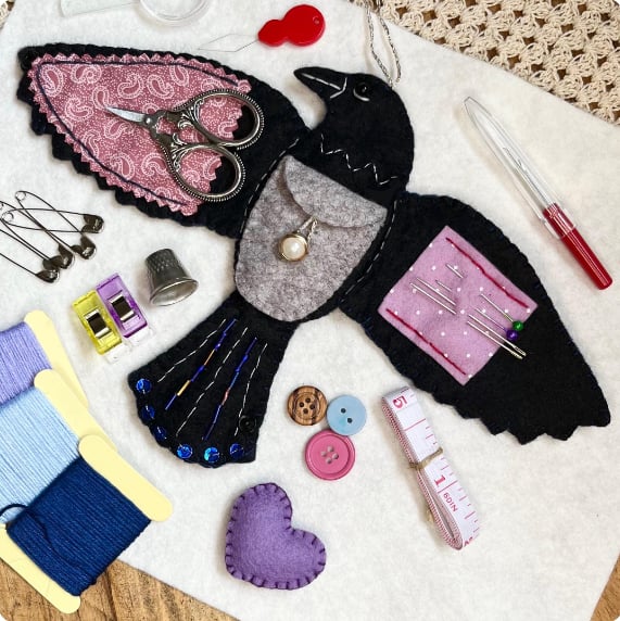 Raven’s Keepsake – Guardian of Stitches”