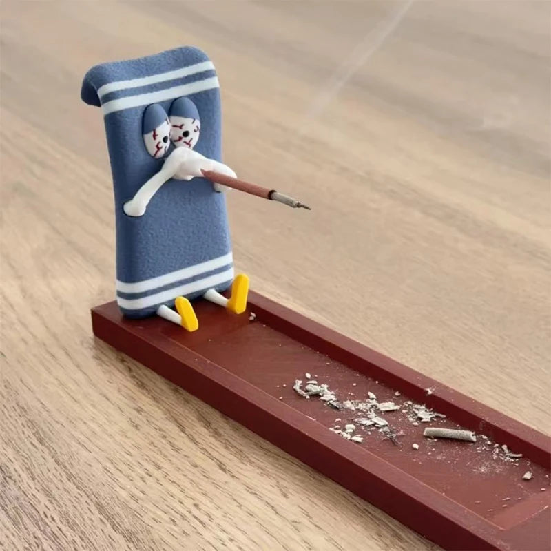 Incense holder shaped like a towel