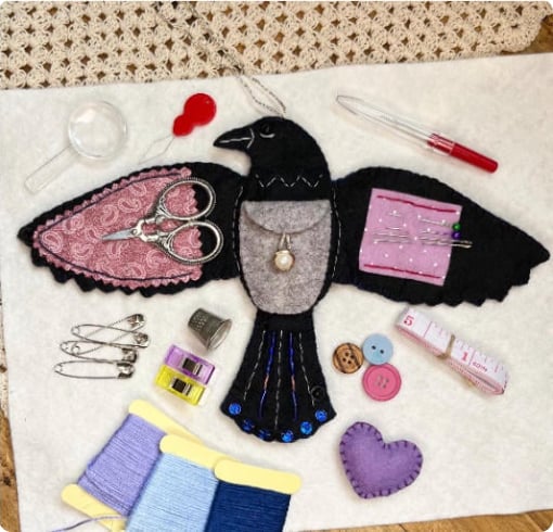 Raven’s Keepsake – Guardian of Stitches”